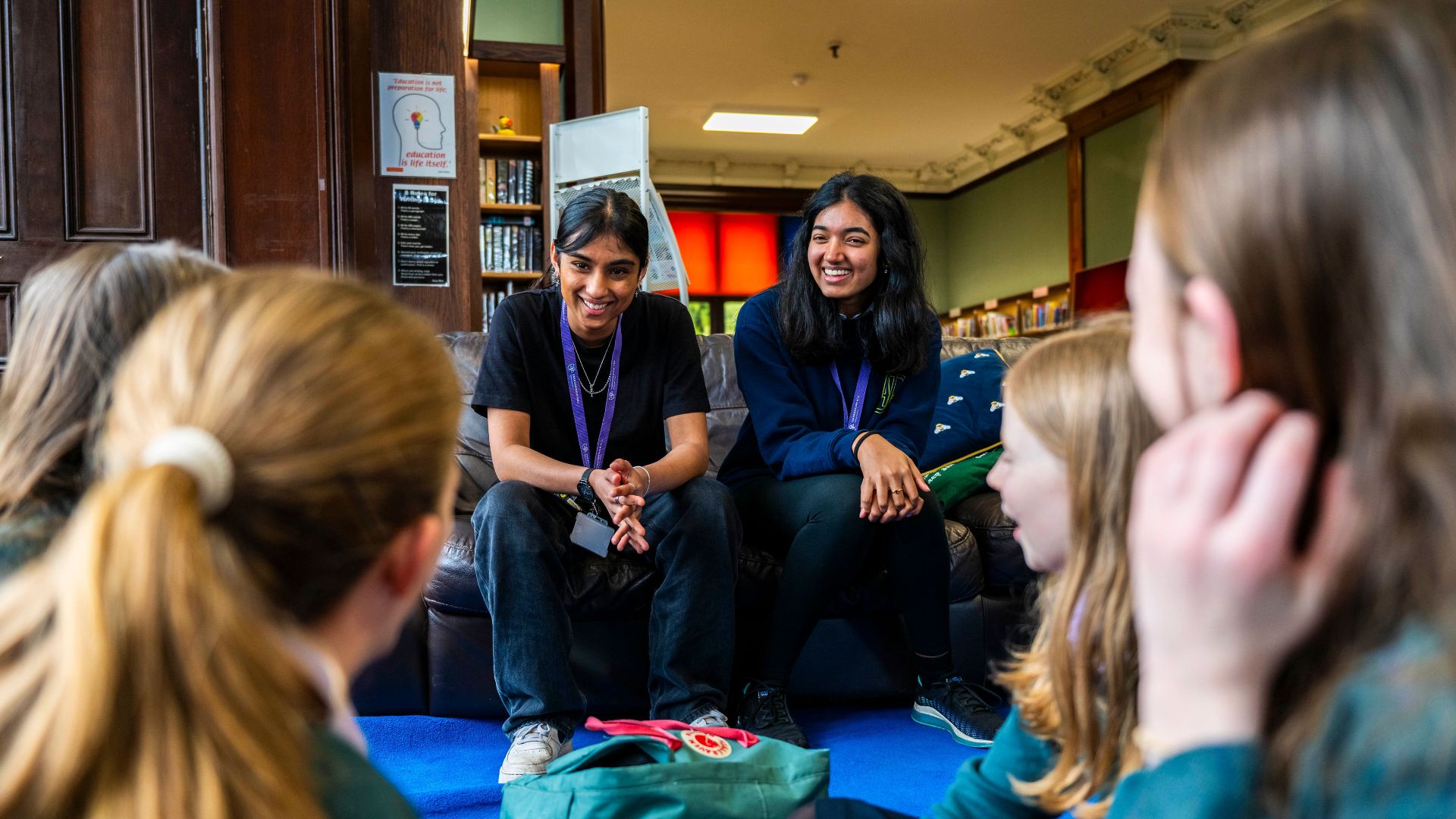 Sixth form students at Farnborough Hill School socialising in a common room.